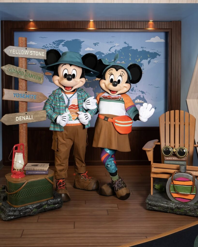 Mickey and Minnie in national parks outfits at the DVC ImaginAtrium
